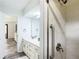Bathroom with shower and accessibility features at 2580 Se 157Th Lane Rd, Summerfield, FL 34491