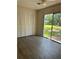 Bedroom with closet and sliding glass doors leading to backyard and ceiling fan at 312 Nw 28Th St, Ocala, FL 34475