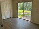 Bedroom with closet and sliding glass doors leading to backyard at 312 Nw 28Th St, Ocala, FL 34475