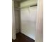 A closet with wood-look floor and a metal shelf is perfect for storage at 312 Nw 28Th St, Ocala, FL 34475