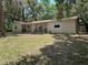Charming single-story home with a welcoming front porch and a well-maintained lawn at 312 Nw 28Th St, Ocala, FL 34475