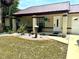 Charming single story house featuring a quaint front porch with white rock landscaping at 340 Oak Track Loop, Ocala, FL 34472