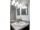 Bathroom featuring a vanity with a sink, framed mirror, and overhead lighting at 3897 Sw 169Th Lane Rd, Ocala, FL 34473