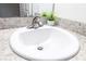 Close-up of a bathroom sink with a modern faucet and granite countertop at 3897 Sw 169Th Lane Rd, Ocala, FL 34473