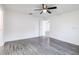 Bedroom featuring wood flooring and a ceiling fan at 3897 Sw 169Th Lane Rd, Ocala, FL 34473