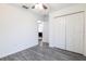 Spacious bedroom with wood floors and a closet for storage at 3897 Sw 169Th Lane Rd, Ocala, FL 34473