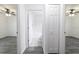 Hallway view of ensuite bathroom and bedroom closets at 3897 Sw 169Th Lane Rd, Ocala, FL 34473