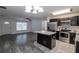 Open floor plan with spacious living room and kitchen combination at 3897 Sw 169Th Lane Rd, Ocala, FL 34473