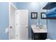 Bright bathroom with stylish mirror, vanity, and decor at 5248 Red Coral Cir, Mount Dora, FL 32757