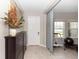 Entryway with decorative furnishings and a glimpse of a home workout area at 5248 Red Coral Cir, Mount Dora, FL 32757