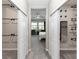 Spacious walk-in closet with custom shelving and rod system at 5248 Red Coral Cir, Mount Dora, FL 32757