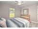 Cozy bedroom with window and dresser at 5410 Nw 62Nd Ave, Ocala, FL 34482