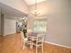 Charming dining area with natural light creating a cozy spot for meals and gatherings at 5410 Nw 62Nd Ave, Ocala, FL 34482