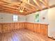 Spacious room with unfinished walls and wooden floors at 5410 Nw 62Nd Ave, Ocala, FL 34482