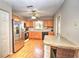 Well-equipped kitchen featuring stainless steel appliances and ample cabinet space for storage at 5410 Nw 62Nd Ave, Ocala, FL 34482