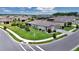View of a well-maintained house on a corner lot with manicured lawns and flowerbeds at 5634 Sw 91St Ave, Ocala, FL 34481