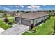 Charming house featuring a well-maintained lawn, mature trees, and attractive curb appeal at 5634 Sw 91St Ave, Ocala, FL 34481