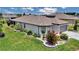 Beautifully landscaped yard around the home, providing curb appeal and serene outdoor spaces at 5634 Sw 91St Ave, Ocala, FL 34481