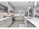 Bright kitchen with stainless steel appliances, plenty of storage, and quartz countertops at 5634 Sw 91St Ave, Ocala, FL 34481