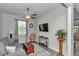 Cozy living room with comfortable seating, decorative rug, and modern television for relaxing entertainment at 5634 Sw 91St Ave, Ocala, FL 34481