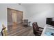 Study featuring hardwood floors and armchair at 5728 Sw 90Th Court Rd, Ocala, FL 34481