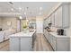 Kitchen island view with stainless appliances, ample counter space and an open floor plan at 5728 Sw 90Th Court Rd, Ocala, FL 34481