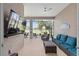 Lanai with furniture and TV offering an inviting view at 5728 Sw 90Th Court Rd, Ocala, FL 34481
