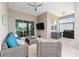 Lanai area features wicker furniture and a view at 5728 Sw 90Th Court Rd, Ocala, FL 34481