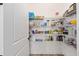 Walk-in pantry with wire shelving offering ample storage space for food and household items at 5728 Sw 90Th Court Rd, Ocala, FL 34481