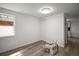 Bright bedroom features light hardwood floors and fresh paint at 719 Nw 8Th St, Ocala, FL 34475