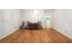Simple dining room with hardwood floors, a classic table set, and clean, bright walls at 8710 Sw 91St Pl # B, Ocala, FL 34481
