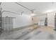 Spacious garage with ample storage shelves and laundry area; ready for projects at 8710 Sw 91St Pl # B, Ocala, FL 34481