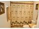 Bathroom with a toilet, vanity, and shower with patterned curtain at 8735 Sw 192Nd Court Rd, Dunnellon, FL 34432