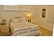 Cozy bedroom with neutral tones, bright natural light, and a comfortably furnished bed at 8735 Sw 192Nd Court Rd, Dunnellon, FL 34432