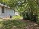 A spacious backyard with lots of green space plus an out-building, offering privacy and room for recreation at 922 Se 13Th St, Ocala, FL 34471