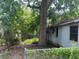 Secluded backyard featuring mature trees and a chain-link fence for privacy in a relaxing outdoor space at 922 Se 13Th St, Ocala, FL 34471