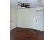 Spacious bedroom featuring hardwood floors, a ceiling fan and ample natural light at 922 Se 13Th St, Ocala, FL 34471