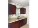 Kitchen sink with wood cabinets and ample countertop space at 922 Se 13Th St, Ocala, FL 34471