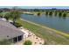 An aerial shot showcases the lakefront property, golf course, and community at 9511 Sw 71St Loop, Ocala, FL 34481