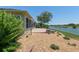 The home features a lovely landscaped backyard with gravel and stone accents at 9511 Sw 71St Loop, Ocala, FL 34481