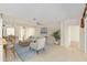 Bright living room with neutral tones, stylish decor and tile flooring at 9511 Sw 71St Loop, Ocala, FL 34481