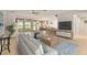 Bright living room with neutral tones, stylish decor and tile flooring at 9511 Sw 71St Loop, Ocala, FL 34481
