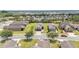 Picturesque aerial view of a community featuring well-maintained homes and green spaces, offering a peaceful living environment at 9658 Sw 76Th Lane Rd, Ocala, FL 34481