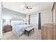 Serene bedroom featuring soft blue accents, a large window, and plush carpeting at 9658 Sw 76Th Lane Rd, Ocala, FL 34481