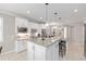 Bright and airy kitchen featuring granite countertops, modern appliances, and a tile backsplash at 9658 Sw 76Th Lane Rd, Ocala, FL 34481