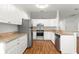 Well-lit kitchen featuring stainless steel appliances and granite countertops at 10016 Sw 62Nd Cir, Ocala, FL 34476