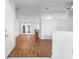 Bright living room with wood floors, recessed lighting, and bar area at 10016 Sw 62Nd Cir, Ocala, FL 34476