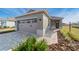 Inviting single-Gathering home featuring a two-car garage and well-maintained landscaping at 10277 Sw 96Th Loop, Ocala, FL 34481