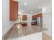 Beautiful kitchen with granite counters, stainless steel appliances, and ample cabinet space at 10277 Sw 96Th Loop, Ocala, FL 34481