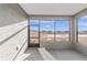 Enclosed outdoor lanai with expansive views of the surrounding landscape at 10277 Sw 96Th Loop, Ocala, FL 34481